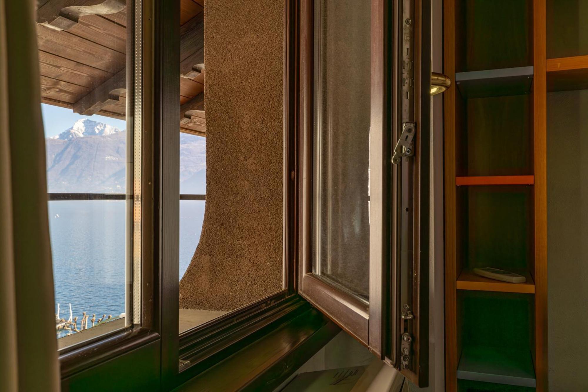 Apartment By The Ferry - メナッジョ エクステリア 写真